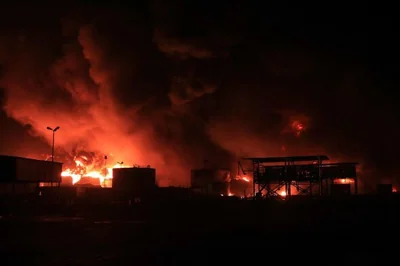 Fire and smoke rising from a refinery in Hodeidah