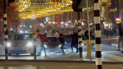 Israeli football supporters and Dutch youth clash near Amsterdam Central station, in Amsterdam