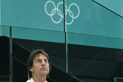 US actor Tom Cruise attends the artistic gymnastics women's qualification during the Paris 2024 Olympic Games at the Bercy Arena in Paris, on July 28, 2024. AFP PHOTO