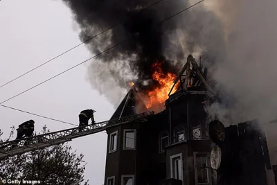 Ukrainian firefighters respond to an artillery strike on November 10, 2024 in Pokrovsk, Ukraine