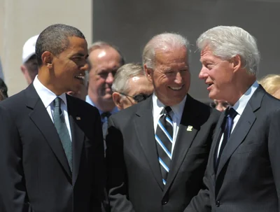 US President Barack Obama (L), Vice President Joe Biden (C) and former president Bill Clinton chat before the start of a memorial service for US Senator Robert Byrd on July 2, 2010 at the West Virginia State Capitol in Charleston, West Virginia.