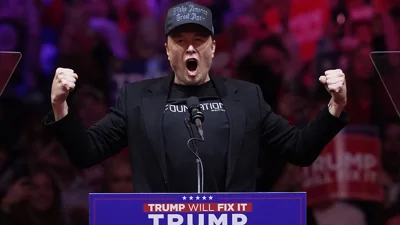 Elon Musk speaks before Republican presidential nominee former President Donald Trump at a campaign rally at Madison Square Garden, Sunday, Oct. 27, 2024, in New York