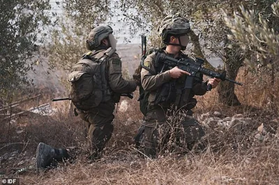 Israeli soldiers are seen entering rural areas of southern Lebanon ahead of an assault on Hezbollah positions