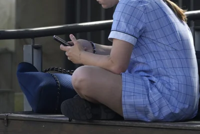 You girl uses smart phone Australia