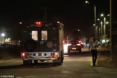 A military ambulance drives near the scene where a drone from Lebanon attacked Israel