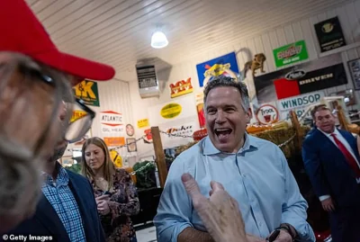 Republican senate candidate, Dave McCormick greets supporters at a campaign rally on October 30, 2024 in Pennsburg, Pennsylvania. The race between McCormick and incumbent Democratic Senator Bob Casey has become one of the country's most expensive and closely watched races as Americans head to the polls for the November 5th general election