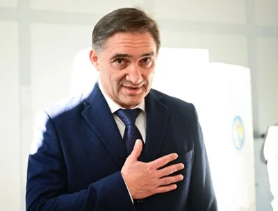 Moldova's presidential candidate Aleksandr Stoianoglo reacts afther he casted his vote for the presidential election at a polling station in Chisinau, Moldova, Sunday. AFP-Yonhap 