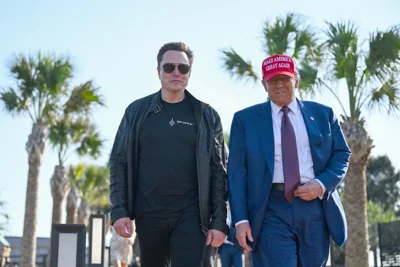 President-elect Donald Trump greets Elon Musk as he arrives to attend a viewing of the launch of the sixth test flight of the SpaceX Starship rocket