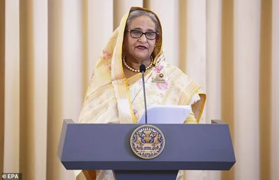 Sheik Hasina (pictured) resigned today and fled to London following the weeks of unrest