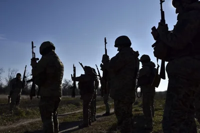 In this photo provided by the Ukraine's 65th Mechanised Brigade press service on Nov. 19, 2024, Ukrainian soldiers attend a training in Zaporizhzhia region, Ukraine