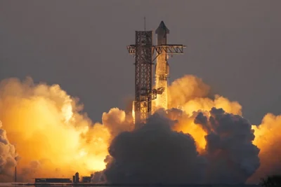 Space SpaceX catches Starship rocket booster in dramatic landing during fifth flight test