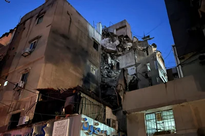 A general view shows a damaged building that was hit by an Israeli airstrike in the southern suburbs of Beirut