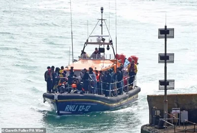 It comes as French authorities rescued some 200 people off the coast of Calais over a 24-hour period between Friday and Saturday night. (File image of migrants being brought to Dover as they attempted to reach the UK earlier this month)