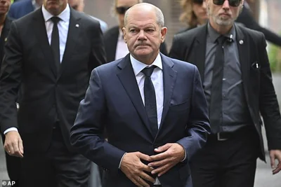 Germany Chancellor Olaf Scholz visits the scene of the knife attack on August 26