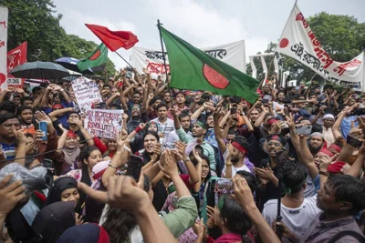 Activists take part in a protest march against Prime Minister Sheikh Hasina and her government to demand justice for more than 200 people killed in last month's demonstrations