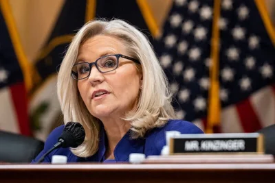 Liz Cheney speaks into a microphone while she was part of a House committee hearing in 2022.