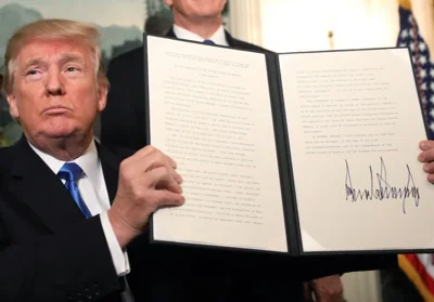 Donald Trump signs his proclamation to formally recognise Jerusalem as the capital of Israel in 2017