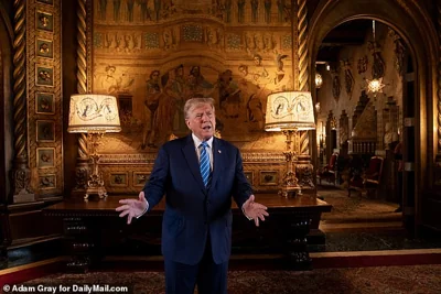 Trump speaks with DailyMail.com during an interview at his Mar-a-Lago club ¿ just five miles down the road from his golf club where shots were fired on Sunday