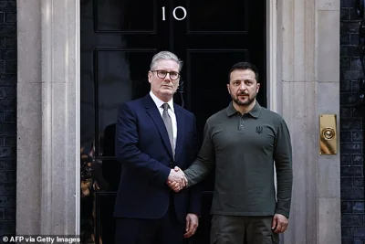 Keir Starmer shakes hands with President Volodymyr Zelensky on the steps of 10 Downing Street on July 19