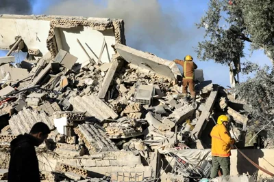 ALL THAT'S LEFT Rescuers search the rubble of a destroyed building following an Israeli airstrike that targeted the Hadath neighborhood in Beirut’s southern suburbs on Nov. 17, 2024. AFP PHOTO