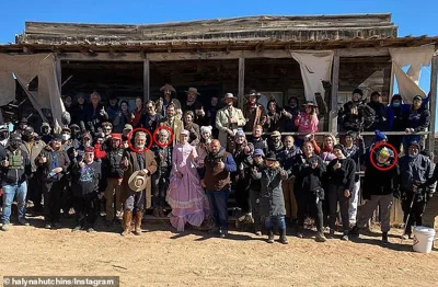 Baldwin, Hutchins and armorer Gutierrez-Reed are circled on the set of Rust alongside fellow cast members and staffers