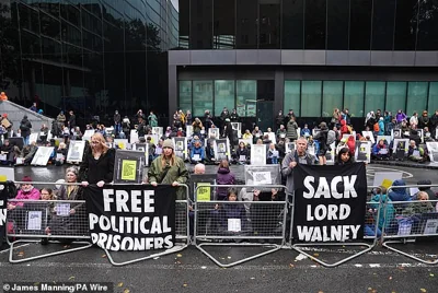 Just Stop Oil supporters gathered outside the court, some of whom held posters of historical figures jailed for activism