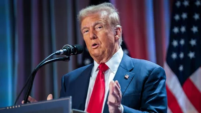 President-elect Donald Trump speaks during a meeting with the House GOP conference, 13 November 2024, in Washington. 