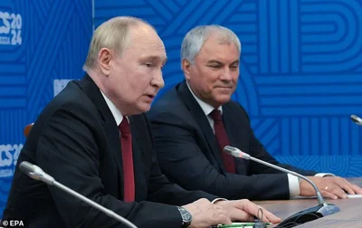 State Duma Speaker Vyacheslav Volodin (right with Vladimir Putin) claimed that Biden 'has created problems all over the world