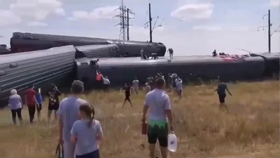 Train crashes into truck on railway crossing, killing two and injuring 100 in Russia