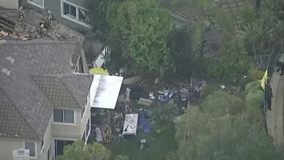 2 people, 1 dog killed after small plane crashes into homes in California, officials say