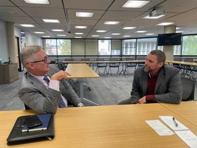 Springfield mayor Rob Rue talks with city manager Bryan Heck in Springfield, Ohio, U.S., August 13, 2024