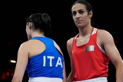 Algeria’s Imane Khelif, right, after defeating Italy’s Angela Carini, left, (AP)