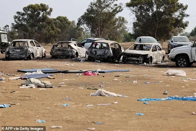 Burnt cars are left behind at the site of the weekend attack on the Supernova desert music Festival by Palestinian militants, near Kibbutz Reim in the Negev desert in southern Israel, on October 10, 2023