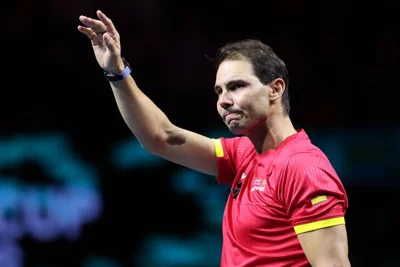 EMOTIONAL  Spain’s Rafael Nadal waves during a tribute to his career at the end of the quarterfinal doubles match between the Netherlands and Spain during the Davis Cup Finals at the Palacio de Deportes Jose Maria Martin Carpena arena in Malaga, southern Spain, on Nov. 19, 2024. Superstar Rafael Nadal’s glittering career in professional tennis came to an end as the Netherlands eliminated Spain in the Davis Cup quarterfinals.  AFP PHOTO