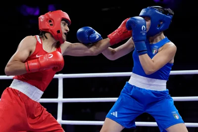 Imane Khelif, left, taking on Angela Carini (John Locher/AP)