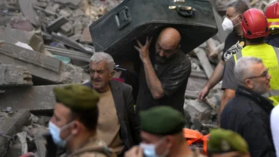 Israeli strikes without warning in central Beirut kill at least 15 as diplomats push for ceasefire