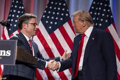 President-elect Donald Trump shakes hands with House Speaker Mike Johnson of La., as he arrives to speak at a meeting with the House GOP conference, Wednesday, Nov. 13, 2024, in Washington. During Trump's remarks before House Republicans he mentioned that he supports Johnson retaining his spot as the GOP leader