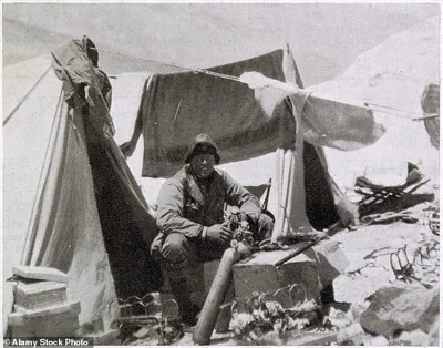 Andrew Irvine is pictured working on an oxygen bottle in the Everest Expedition camp in 1924