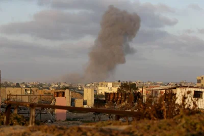 DEIR AL BALAH, GAZA - MAY 3: Smoke rises from the area after the Israeli army attacked Nuseirat refugee camp in Deir Al Balah, Gaza on May 3