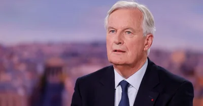 New French PM Barnier pledges to defend key Macron policies, hints at rightward shift