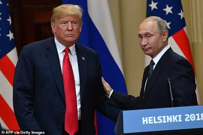 Under a peace bid being considered by Mr Trump's security advisers, UK and other European troops would enforce an 800-mile buffer zone between the Russian and Ukrainian armies. (Donald Trump pictured with Vladimir Putin in 2018)