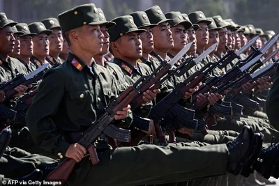 Korean People's Army (KPA) soldiers march during a mass rally on Kim Il Sung square in Pyongyang on September 9, 2018.