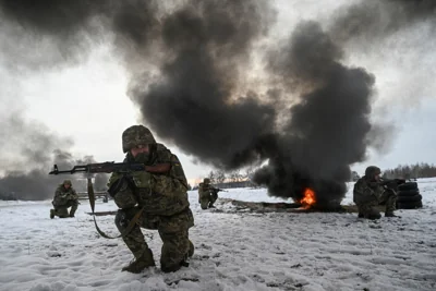 Ukrainian service members attend a military exercises during drills at a training ground in Chernihiv region, Ukraine