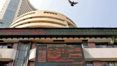 Stock market crash: A bird flies past a screen displaying the Sensex results on the facade of the Bombay Stock Exchange (BSE) building in Mumbai.(Reuters)