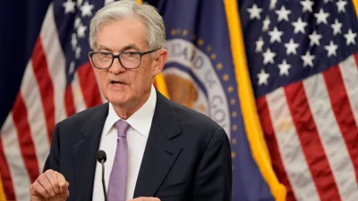 Federal Reserve cuts its key interest rate by a quarter-point amid postelection uncertainty