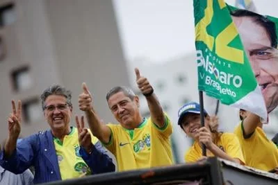 Vice presidential candidate Braga Netto attends a motorcade during an election campaign in Brasilia