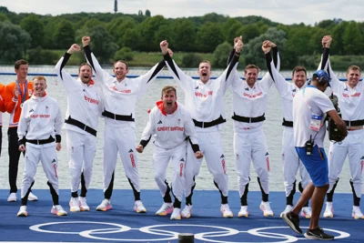 Great Britain’s men’s eight celebrate the rowing squad’s third gold medal of Paris 2024 (Peter Byrne/PA)