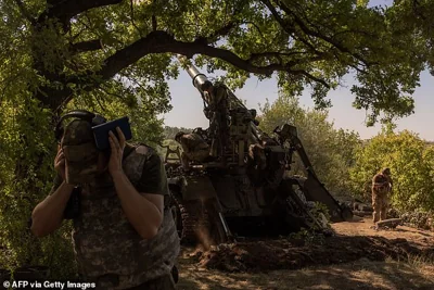 Ukrainian servicemen of the 43rd Artillery Brigade fire self-propelled artillery 2S7 Pion toward Russian positions, in an undisclosed area, in the Pokrovsk district, eastern Donetsk region, on August 8, 2024