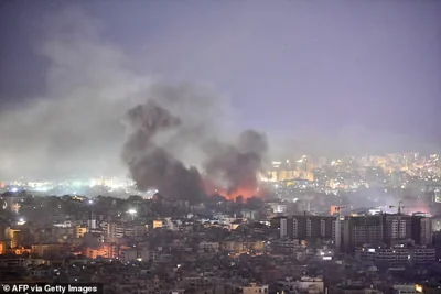 Smoke rises from the site of an Israeli airstrike that targeted a neighborhood in a southern Beirut suburb, on October 3