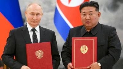 Vladimir Putin and Kim Jong Un